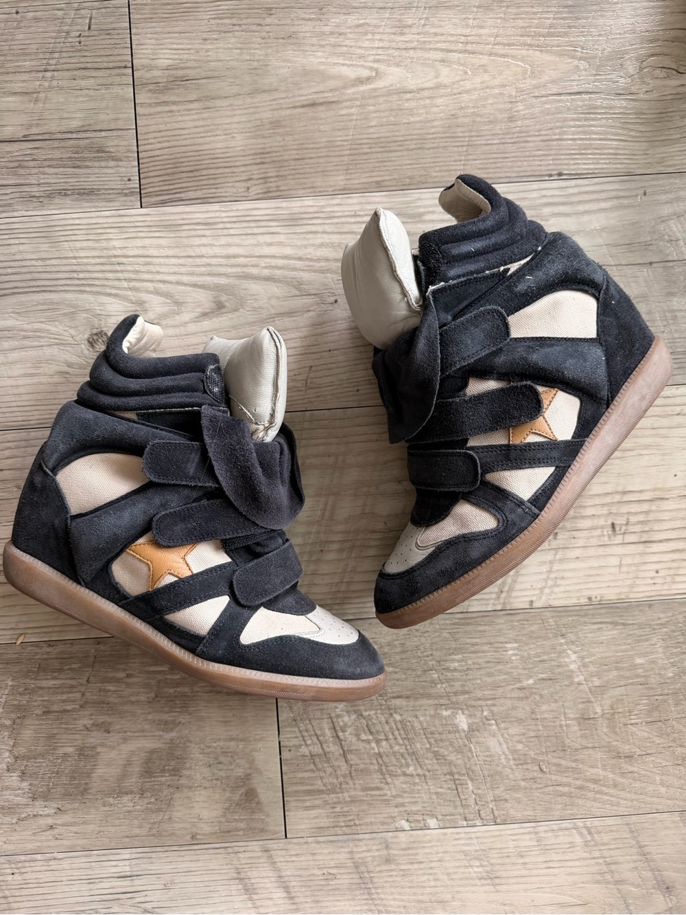 Authentic Isabel Marant Bekett wedge sneaker in blue with a yellow star